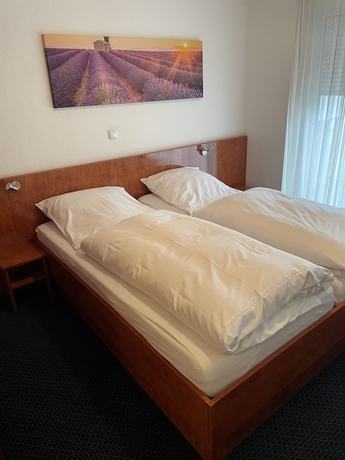 Imagen de la habitación del Hotel Garni Merkenich. Foto 6