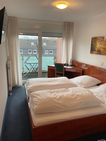 Imagen de la habitación del Hotel Garni Merkenich. Foto 7