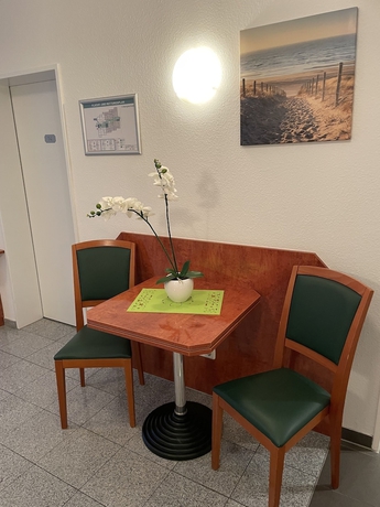 Imagen de la habitación del Hotel Garni Merkenich. Foto 12