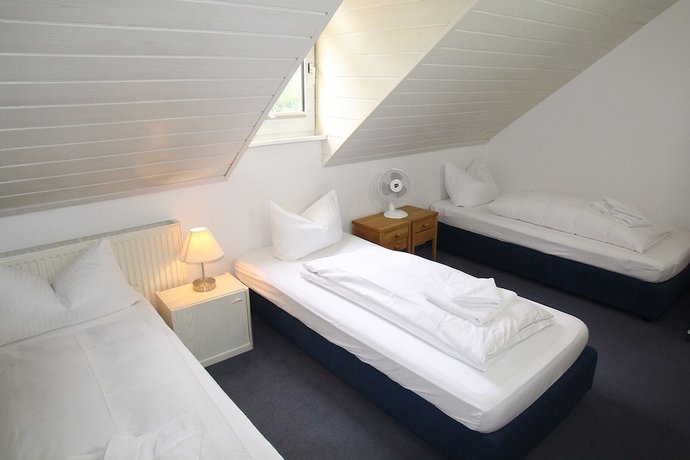 Imagen de la habitación del Hotel Garni Niedernhausen. Foto 17