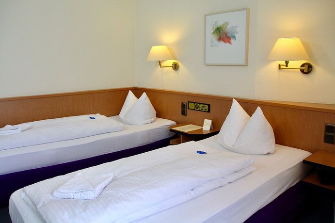 Imagen de la habitación del Hotel Garni Niedernhausen. Foto 18