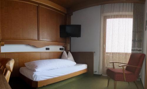 Imagen de la habitación del Hotel Garni Obermair. Foto 9