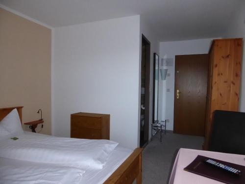 Imagen de la habitación del Hotel Garni Post. Foto 7