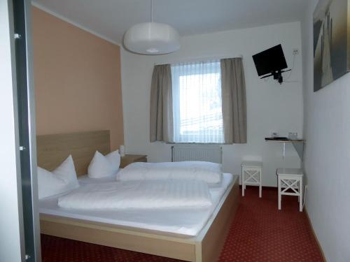 Imagen de la habitación del Hotel Garni Post. Foto 10