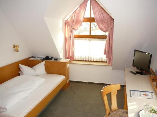 Imagen de la habitación del Hotel Garni Schmid. Foto 9