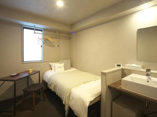 Imagen de la habitación del Hotel Gee Haive. Foto 19