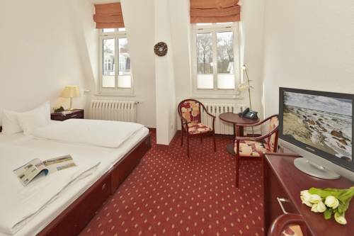 Imagen de la habitación del Hotel Germania. Foto 12