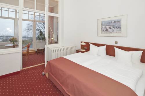 Imagen de la habitación del Hotel Germania. Foto 15