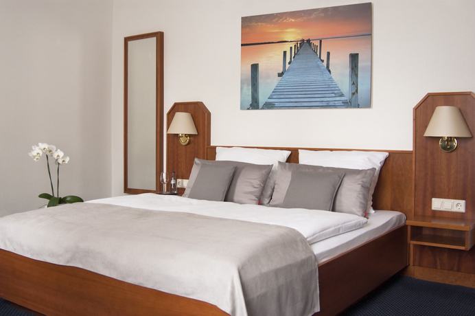 Imagen de la habitación del Hotel Germania. Foto 12