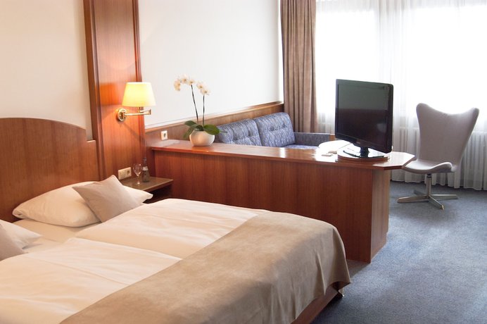 Imagen de la habitación del Hotel Germania. Foto 15