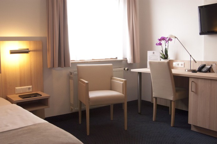 Imagen de la habitación del Hotel Germania. Foto 17