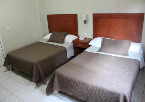 Imagen de la habitación del Hotel Gina. Foto 18