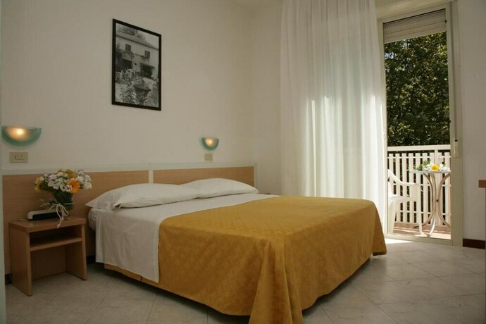 Imagen de la habitación del Hotel Giuliana. Foto 21