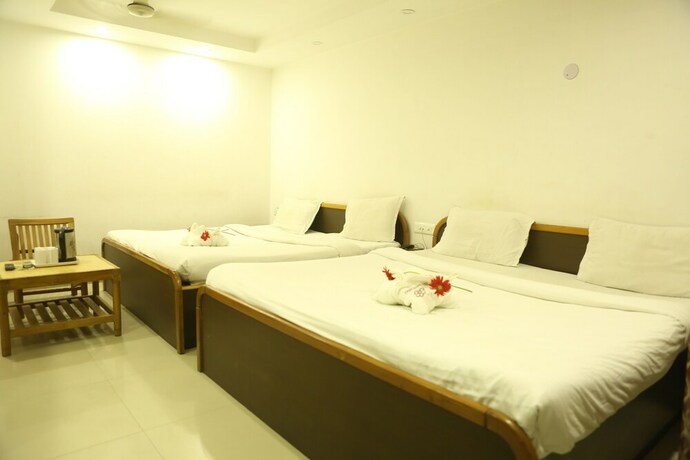 Imagen de la habitación del Hotel Gms Grand. Foto 11
