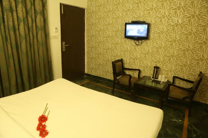 Imagen de la habitación del Hotel Gms Grand. Foto 14