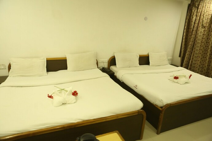 Imagen de la habitación del Hotel Gms Grand. Foto 16