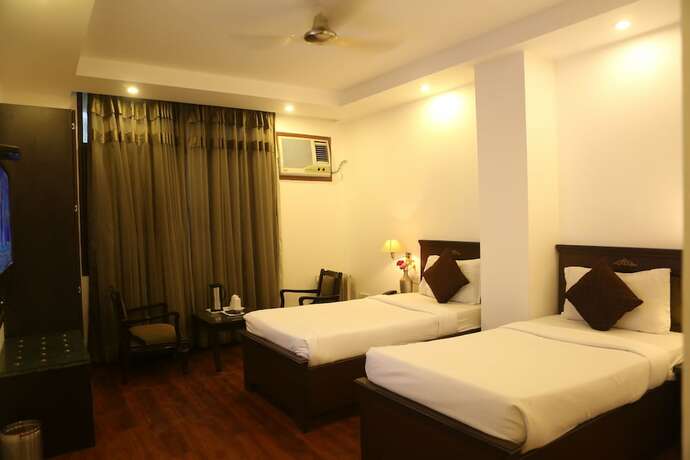 Imagen de la habitación del Hotel Gms Grand. Foto 25