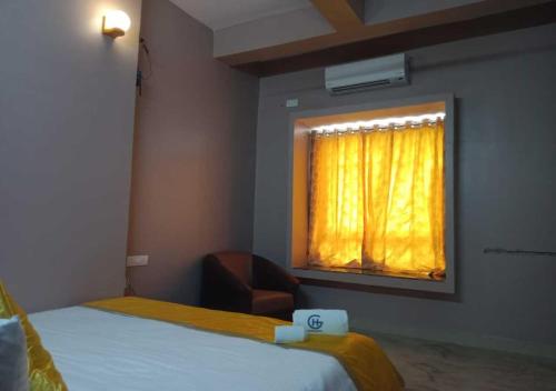 Imagen de la habitación del Hotel Golden Heights Gokarna. Foto 18