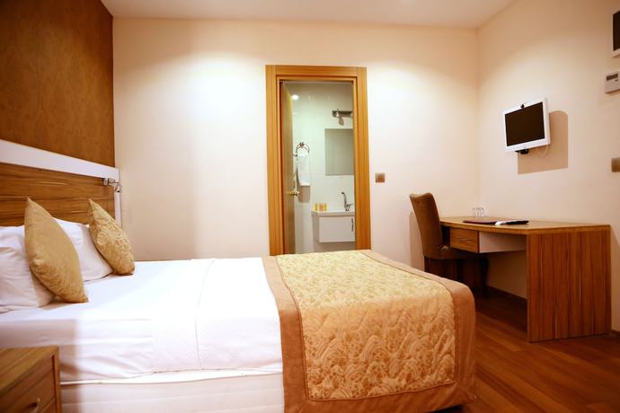 Imagen de la habitación del Hotel Golden King. Foto 11