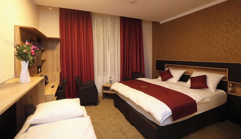 Imagen de la habitación del Hotel Golden Pearl Magdeburg Im Stadtzentrum. Foto 4