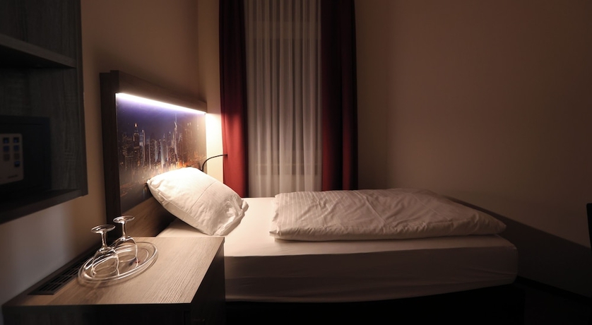 Imagen de la habitación del Hotel Golden Pearl Magdeburg Im Stadtzentrum. Foto 7