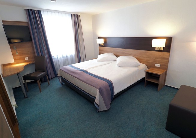 Imagen de la habitación del Hotel Goldener Hirsch Mosbach. Foto 11