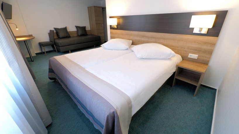 Imagen de la habitación del Hotel Goldener Hirsch Mosbach. Foto 12