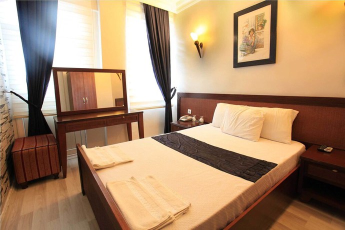 Imagen de la habitación del Hotel Grand Urhay. Foto 6