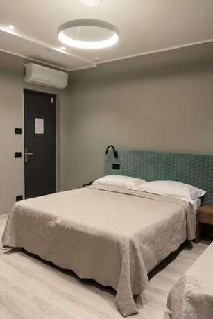 Imagen de la habitación del Hotel Graziella. Foto 18