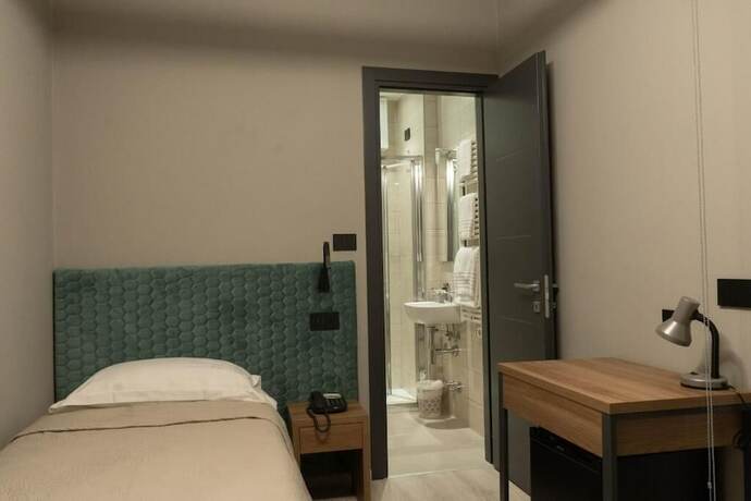 Imagen de la habitación del Hotel Graziella. Foto 19