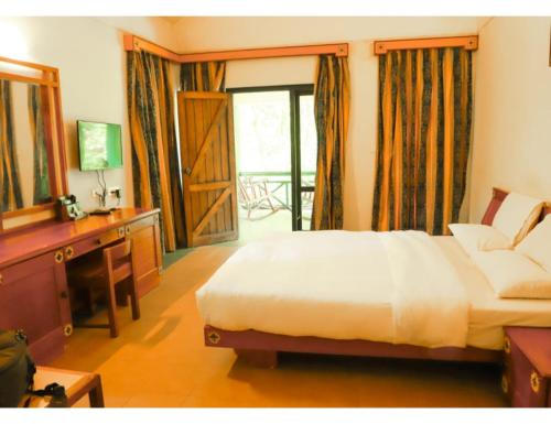 Imagen de la habitación del Hotel Green Gates, Madathumpadi, Kerala. Foto 16