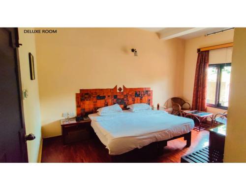 Imagen de la habitación del Hotel Green Gates, Madathumpadi, Kerala. Foto 19