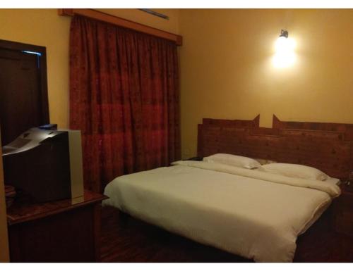 Imagen de la habitación del Hotel Green Gates, Madathumpadi, Kerala. Foto 20
