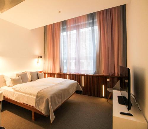 Imagen de la habitación del Hotel H24 Berlin Lichtenberg. Foto 5