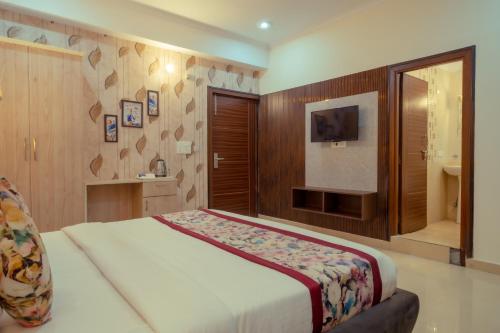 Imagen general del Hotel HSR View Inn - Sahastradhara IT Park. Foto 5