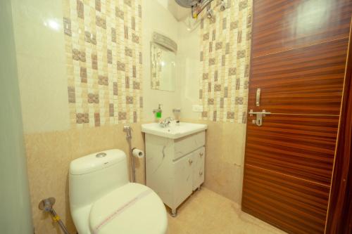 Imagen de la habitación del Hotel HSR View Inn - Sahastradhara IT Park. Foto 20