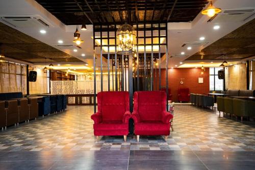 Imagen general del Hotel HSR View Inn - Sahastradhara IT Park. Foto 14