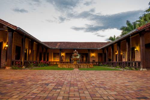 Imagen de la habitación del Hotel Hacienda Palo A Pique. Foto 2