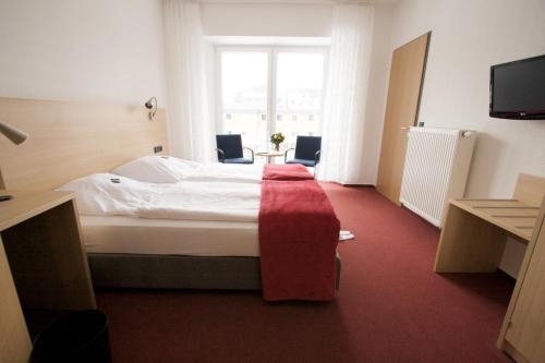 Imagen de la habitación del Hotel Haus Vom Guten Hirten. Foto 8