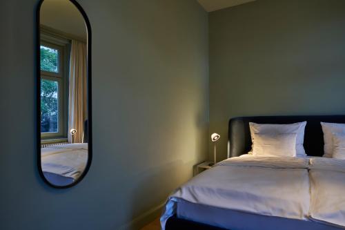 Imagen de la habitación del Hotel Heimhude. Foto 18