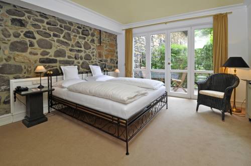 Imagen de la habitación del Hotel Herrenhaus Von L&ouml;w. Foto 3
