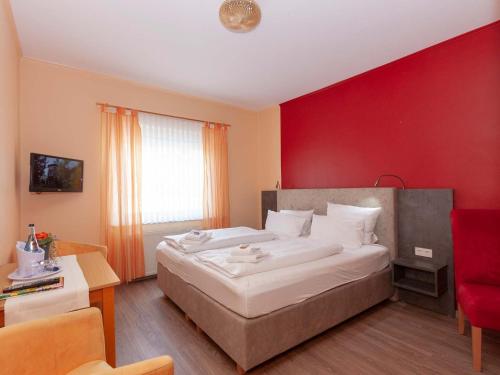 Imagen de la habitación del Hotel Herrlichkeit Dornum Jan&szlig;en. Foto 7