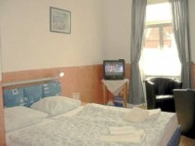 Imagen de la habitación del Hotel Hohenzollernhof. Foto 7