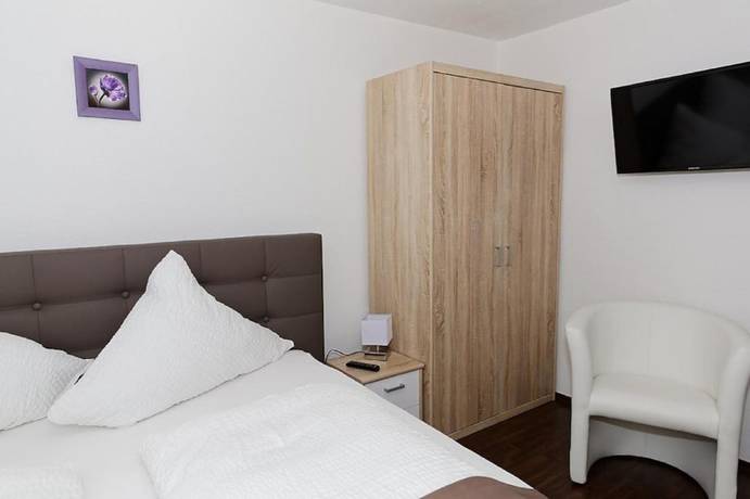 Imagen de la habitación del Hotel H&uuml;ttl - Garni. Foto 8