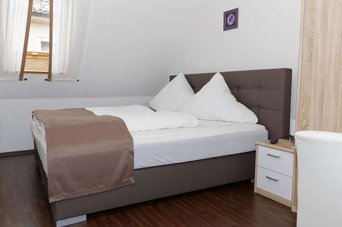 Imagen de la habitación del Hotel H&uuml;ttl - Garni. Foto 13