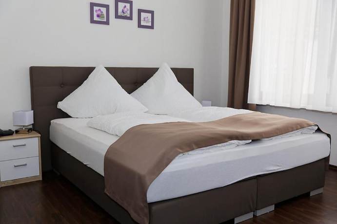 Imagen de la habitación del Hotel H&uuml;ttl - Garni. Foto 15