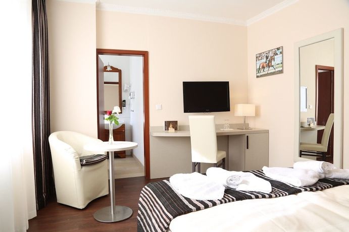 Imagen de la habitación del Hotel Il Cavallino. Foto 12