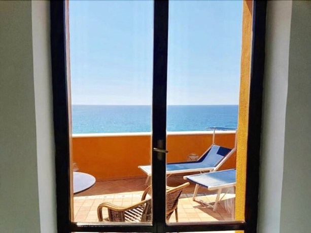 Imagen de la habitación del Hotel Il Gabbiano Palinuro. Foto 7