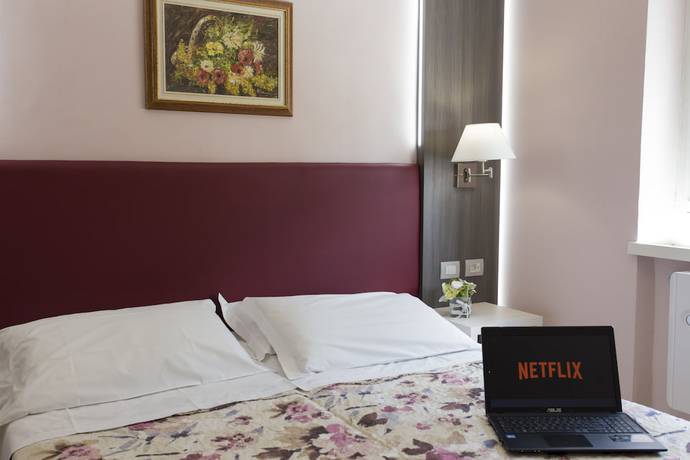 Imagen de la habitación del Hotel Il Giardino. Foto 2