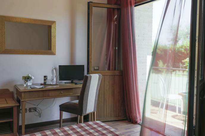 Imagen de la habitación del Hotel Il Giardino. Foto 5